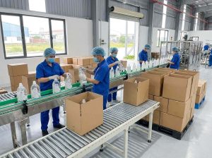 Workers packing cleaning products 202608081816
